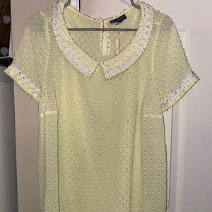 ModCloth yellow blouse with white flowers around the collar and sleeve